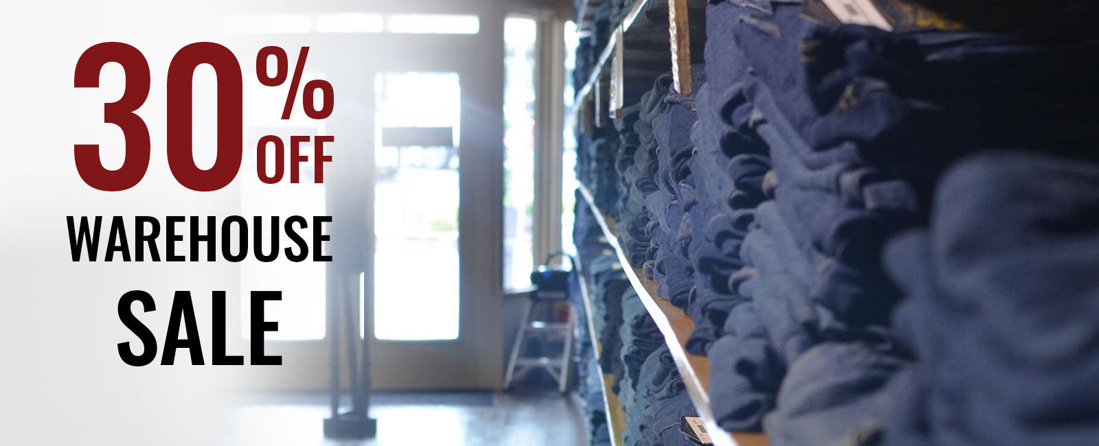 Warehouse sale banner with 30% off text in a warehouse setting.